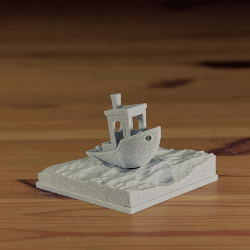 3d Printing White Boat In A Sea GIF