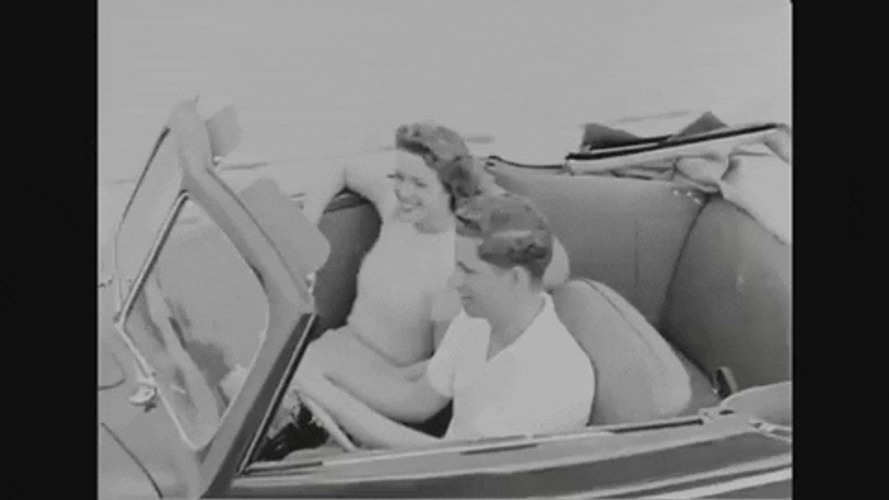 40s Couple Riding Together GIF