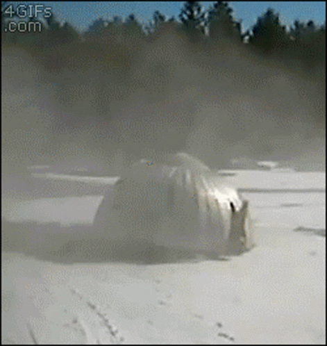 4Gifs Car Driving Through Snowy Field