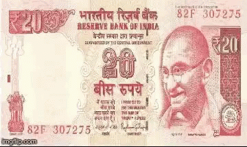 A 20 Rupee Banknote From The Reserve Bank Of India With A Picture Of Mahatma Gandhi On It . GIF