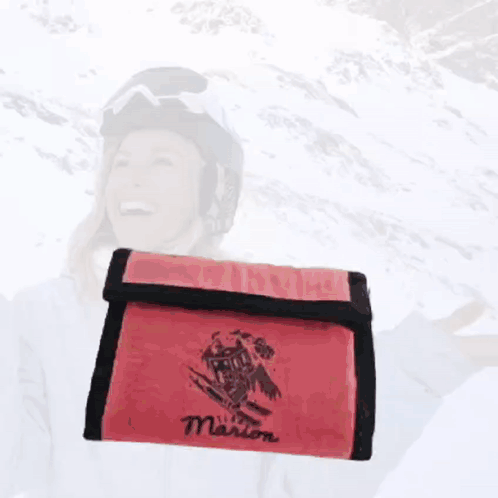A 50 Euro Bill Next To A Red Wallet With The Name Marion On It GIF
