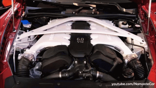 A 6.0 V12 Engine Is Shown With The Hood Up GIF
