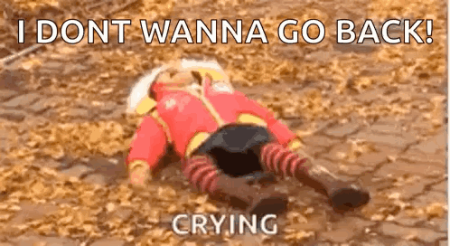 A Baby Doll Is Laying On The Ground With A Caption That Says `` I Dont Wanna Go Back ! '' GIF