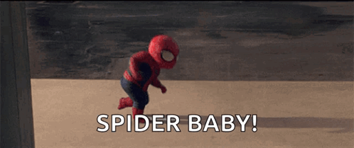 A Baby Dressed In A Spider Man Costume Says Spider Baby ! GIF
