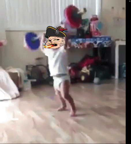 a baby in a diaper with a picture of a pirate on his head