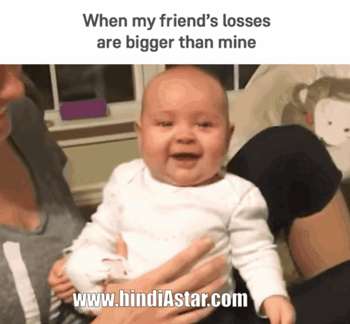 A Baby Is Being Held By A Woman With The Website Www.hindiastar.com Underneath It GIF