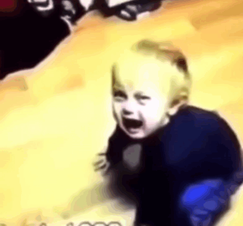 A Baby Is Crawling On The Floor And Crying . GIF
