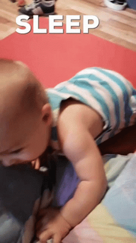A Baby Is Crawling On The Floor With The Word Sleep Above It GIF