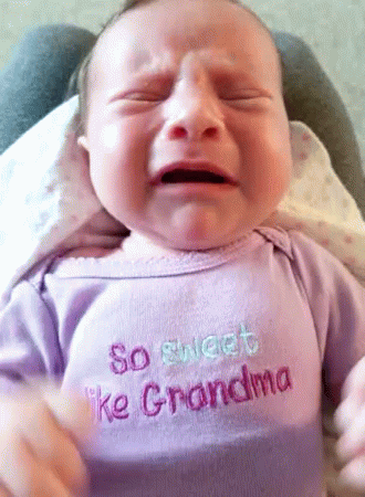 A Baby Is Crying While Wearing A Shirt That Says So Sweet Like Grandma GIF