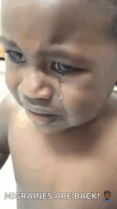 A Baby Is Crying With A Tear Coming Out Of His Eyes . GIF
