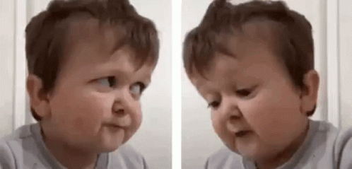 A Baby Is Making A Funny Face And Making A Funny Face . GIF