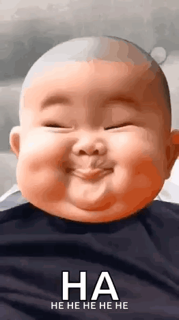 A Baby Is Making A Funny Face With His Eyes Closed And Laughing . GIF