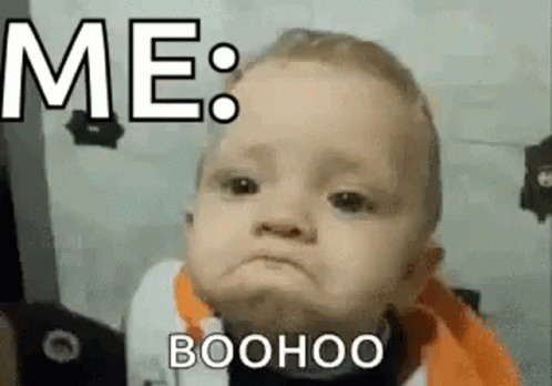 A Baby Is Making A Funny Face With The Words `` Me : Boohoo '' Written Above It . GIF