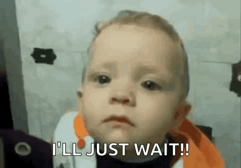 A Baby Is Making A Sad Face And Saying `` I 'Ll Just Wait '' . GIF