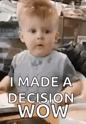 A Baby Is Sitting In A High Chair And Making A Funny Face While Saying `` I Made A Decision Wow '' . GIF