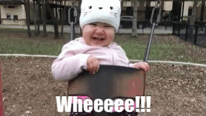 A Baby Is Sitting On A Swing At A Playground And Crying . GIF