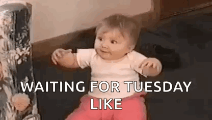 A Baby Is Sitting On The Floor With The Words `` Waiting For Tuesday Like '' Written On It . GIF