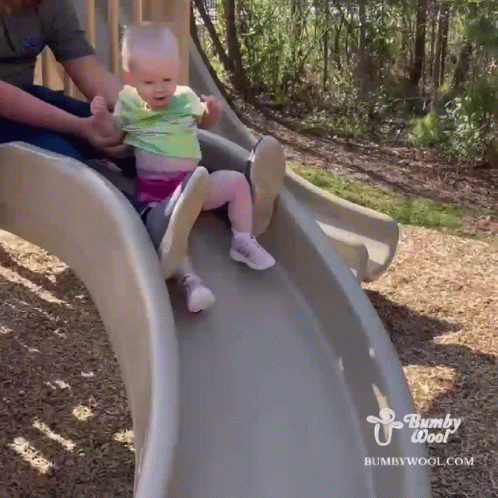 A Baby Is Sliding Down A Slide With Bumpywool.com Written On The Bottom GIF