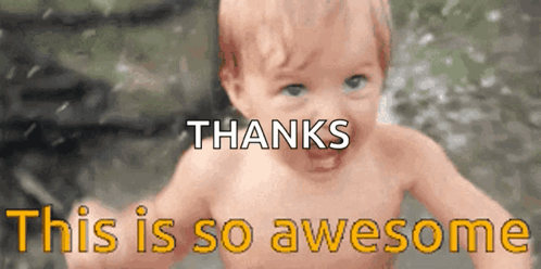 A Baby Is Smiling With The Words Thanks This Is So Awesome Behind Him GIF