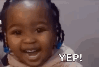 a baby is smiling with the words yep written next to her .