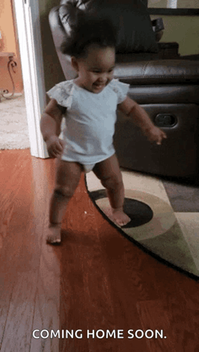 A Baby Is Walking On A Rug With The Words Coming Home Soon GIF