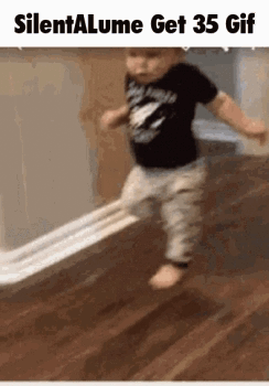 A Baby Is Walking On A Wooden Floor With The Words Silentalume Get 35 Gif Below Him . GIF