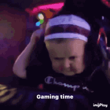 A Baby Is Wearing Headphones And A Headband And Says `` Gaming Time '' . GIF