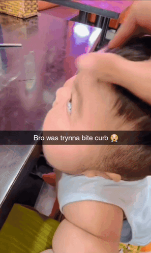 A Baby 'S Face Is Shown With A Caption That Says " Bro Was Trynna Bite Curb " GIF