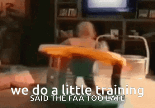 A Baby Sits At A Table With The Words We Do A Little Training Said The Faa Too Late Below It GIF