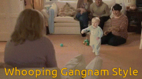 A Baby Walking In A Living Room With The Words Whooping Gangnam Style GIF
