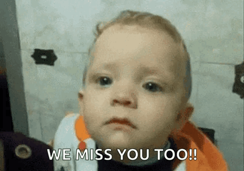 A Baby With A Sad Look On His Face And The Words We Miss You Too On The Bottom GIF