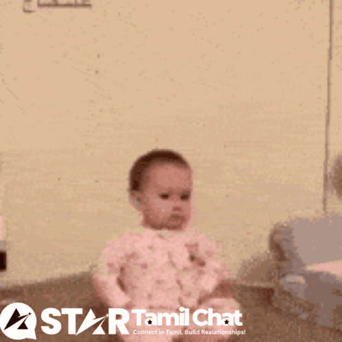 A Baby With A Star Tamil Chat Logo In The Corner GIF