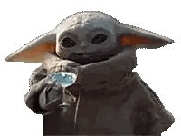 a baby yoda is holding a glass of water in his hand .