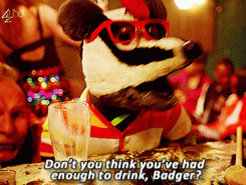 Badger Wearing Sunglasses Sitting At Table With Water GIF