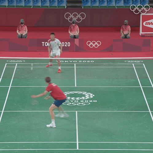 A Badminton Court With Tokyo 2020 On The Floor GIF