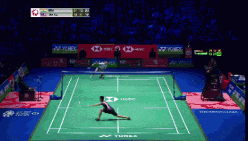 A Badminton Game Is Being Played On A Court Sponsored By Yonex And Hsbc GIF