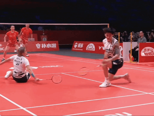 A Badminton Player Wearing A Shirt That Says ' Chen Malaysia ' GIF