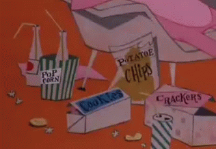 A Bag Of Potato Chips Sits Next To A Box Of Crackers GIF