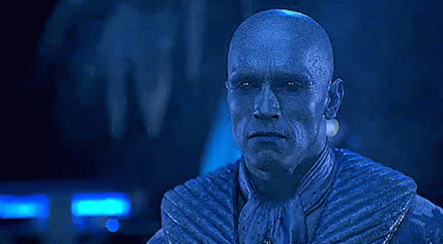 A Bald Man In A Blue Suit With The Words `` You Lie !!! '' Written On His Face . GIF