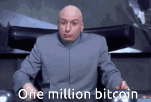 A Bald Man In A Gray Suit Is Sitting In A Chair And Says One Million Bitcoin GIF