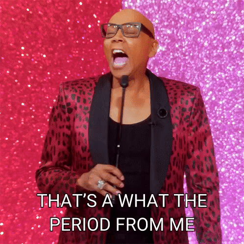 A Bald Man In A Leopard Print Suit Is Speaking Into A Microphone And Saying That 'S A What The Period From Me GIF
