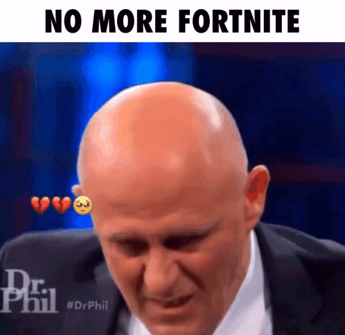 A Bald Man In A Suit And Tie Is Crying With Hearts On His Forehead . GIF