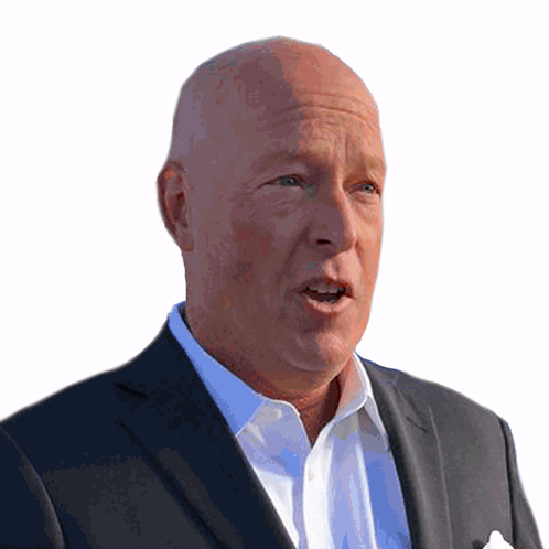 A Bald Man In A Suit And White Shirt Is Speaking GIF