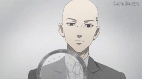 A Bald Man In A Suit Is Holding A Magnifying Glass And Saying I 'M Glad You 'Re Okay GIF
