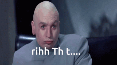 A Bald Man In A Suit With The Words Rihhh Tht T.. GIF