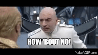 A Bald Man In A White Suit Is Talking To Another Bald Man In A Room . GIF