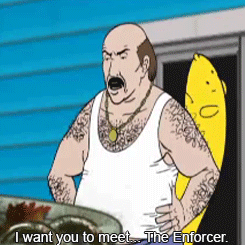 Bald Man In White Tank Top Next To Banana GIF