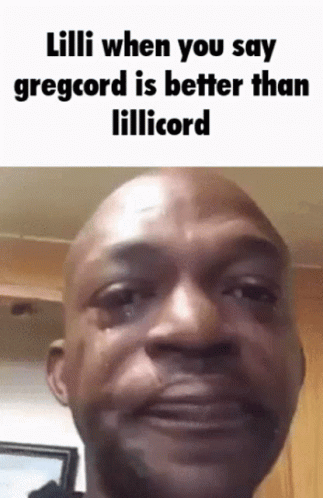 A Bald Man Is Crying While Making A Funny Face . GIF