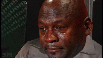 A Bald Man Is Crying With Tears Running Down His Face While Wearing A White Shirt . GIF