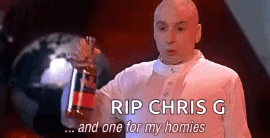 A Bald Man Is Holding A Bottle Of Soda In His Hand And Saying `` Rip Chris G And One For My Homies '' . GIF